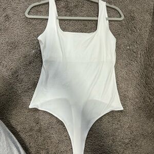New White Bodysuit - Size M.